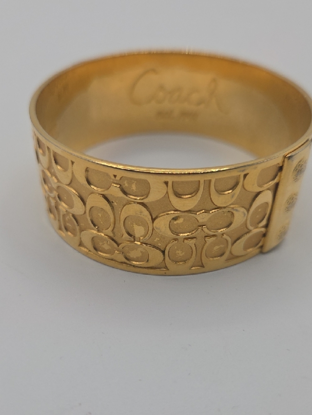 Coach Gold Signature C Embossed Hinged Bangle Bracelet